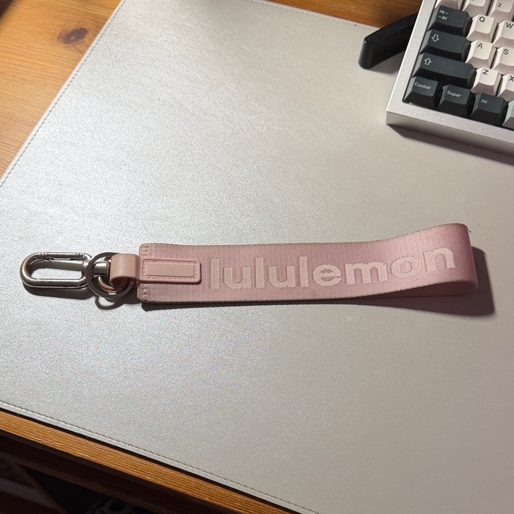 Lululemon Pink Never Lost Keychain
